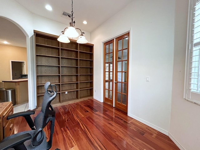13809 18th Pl E, Bradenton, FL 34212 - office with arched walkways, wood finished floors, baseboards, and recessed lighting