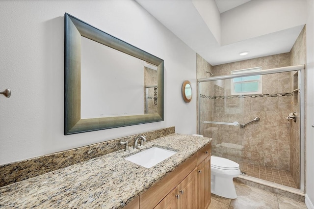 15208 21st Ave E, Bradenton, FL 34212 - bathroom featuring toilet, vanity, a shower stall, and tile patterned flooring