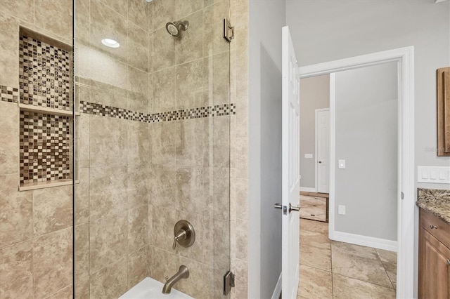 15208 21st Ave E, Bradenton, FL 34212 - full bath featuring vanity, tiled shower / bath, and baseboards