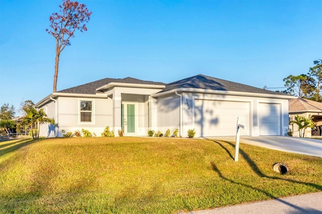 2258 Margaret Ln, North Port, FL 34286 - view of front of home featuring stucco siding, concrete driveway, a front lawn, and a garage