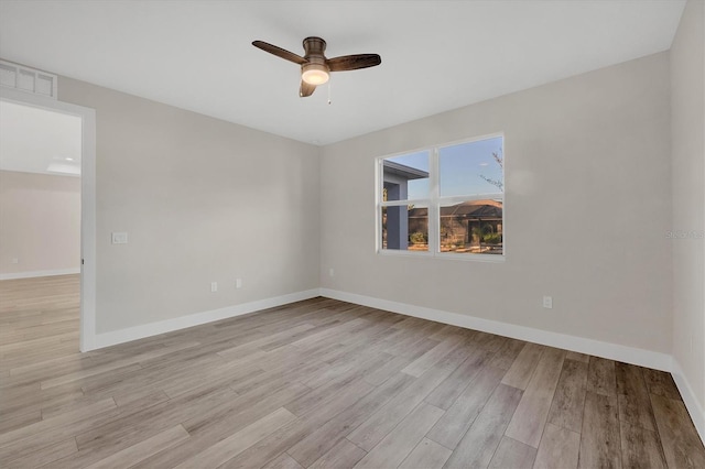 2258 Margaret Ln, North Port, FL 34286 - spare room with light wood finished floors and a ceiling fan