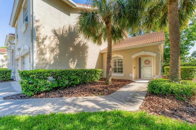 7160 Cedar Hollow Cir, Bradenton, FL 34203 - mediterranean / spanish-style home featuring stucco siding and a tile roof