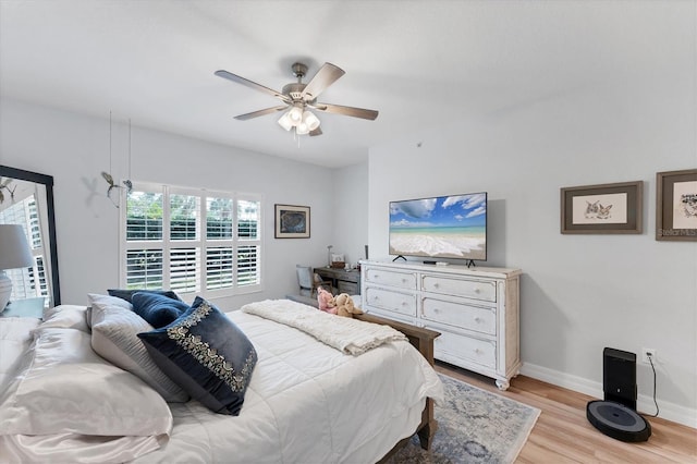 7160 Cedar Hollow Cir, Bradenton, FL 34203 - bedroom featuring light wood-type flooring, baseboards, and ceiling fan