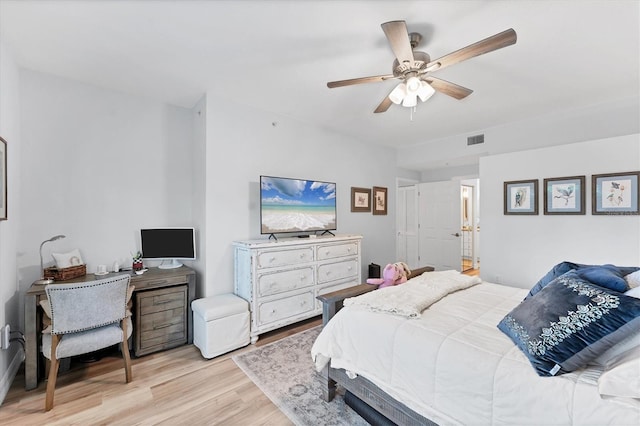 7160 Cedar Hollow Cir, Bradenton, FL 34203 - bedroom featuring light wood-style flooring, ceiling fan, and an office area