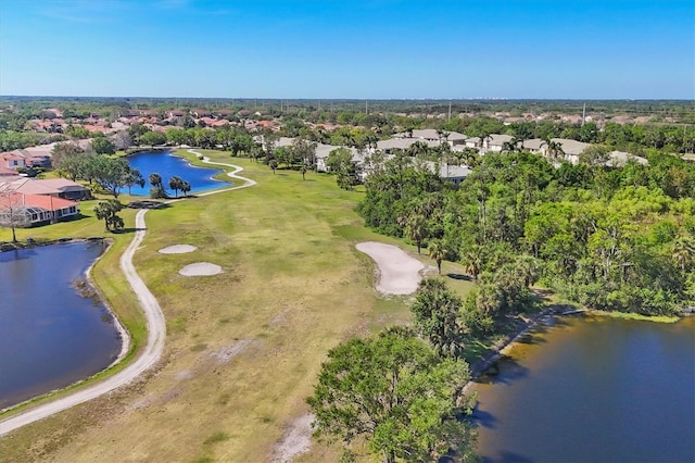 7160 Cedar Hollow Cir, Bradenton, FL 34203 - aerial view of property's location with nearby suburban area, a local golf course, a nearby body of water, and a tree filled landscape