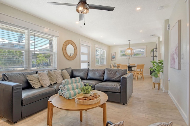 2908 Gulf Dr, Holmes Beach, FL 34217 - living room featuring light wood finished floors, baseboards, recessed lighting, and ceiling fan