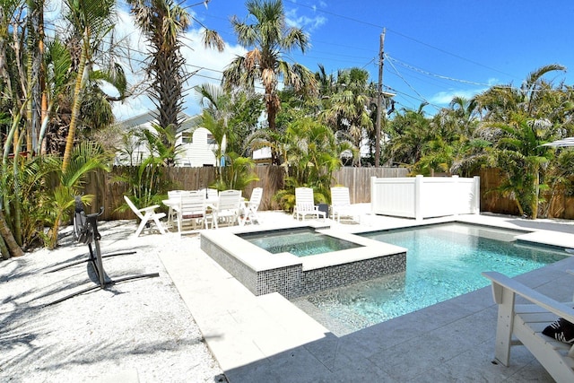 2908 Gulf Dr, Holmes Beach, FL 34217 - view of swimming pool with a patio, an in-ground hot tub, and a fenced backyard