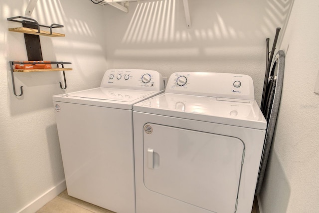 2908 Gulf Dr, Holmes Beach, FL 34217 - laundry room with independent washer and dryer