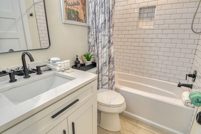 2908 Gulf Dr, Holmes Beach, FL 34217 - bathroom featuring toilet, shower / tub combo with curtain, and vanity
