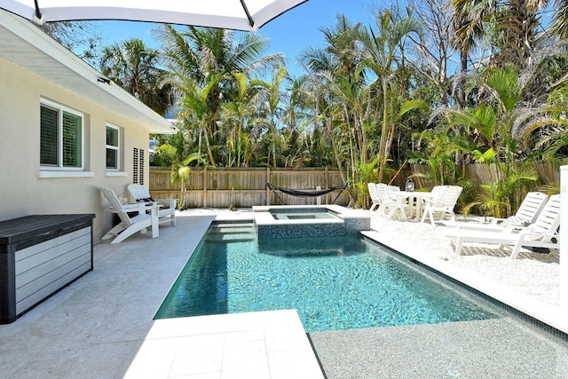 2908 Gulf Dr, Holmes Beach, FL 34217 - view of pool with a fenced backyard, a patio area, and a pool with connected hot tub
