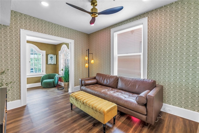 1221 N Palm Ave Unit 303, Sarasota, FL 34236 - living room featuring baseboards, wood finished floors, a ceiling fan, and wallpapered walls