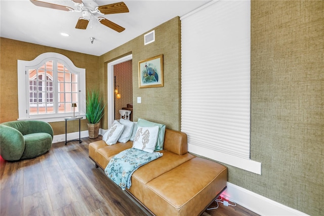 1221 N Palm Ave Unit 303, Sarasota, FL 34236 - living area with wood finished floors, ceiling fan, recessed lighting, and baseboards