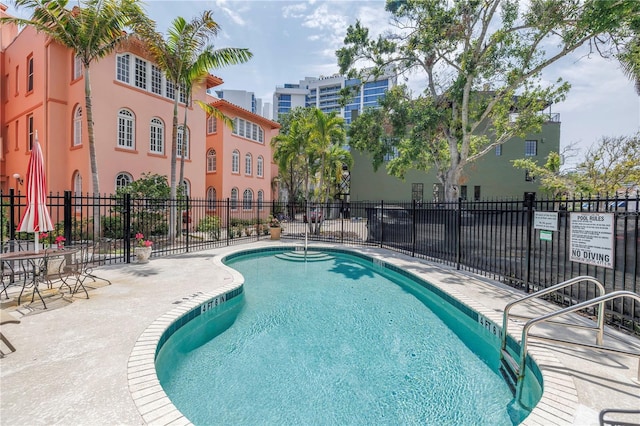 1221 N Palm Ave Unit 303, Sarasota, FL 34236 - community pool with a patio