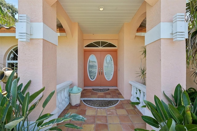321 Sorrento Dr, Osprey, FL 34229 - doorway to property featuring stucco siding
