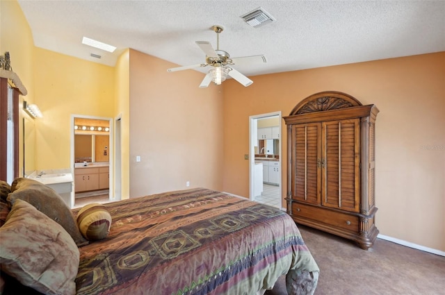 321 Sorrento Dr, Osprey, FL 34229 - bedroom featuring ensuite bathroom, carpet floors, a textured ceiling, ceiling fan, and a sink