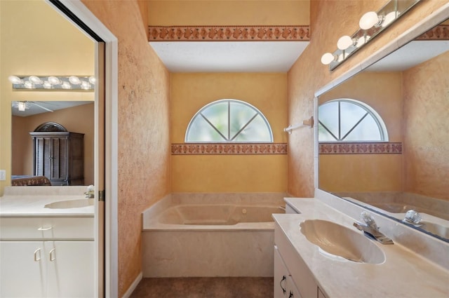 321 Sorrento Dr, Osprey, FL 34229 - bathroom with healthy amount of natural light, vanity, and a garden tub