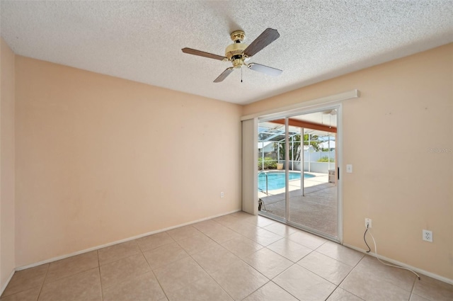 321 Sorrento Dr, Osprey, FL 34229 - unfurnished room featuring ceiling fan, a sunroom, baseboards, a textured ceiling, and light tile patterned flooring