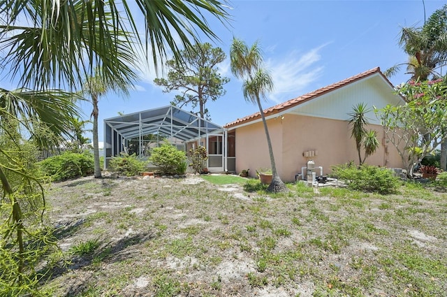 321 Sorrento Dr, Osprey, FL 34229 - view of yard featuring glass enclosure