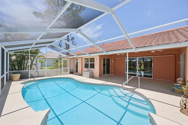 321 Sorrento Dr, Osprey, FL 34229 - swimming pool featuring a patio area and glass enclosure