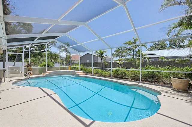 321 Sorrento Dr, Osprey, FL 34229 - view of swimming pool featuring a patio and glass enclosure