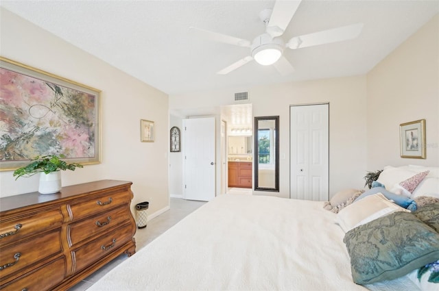 1170 Bird Bay Way Unit 206, Venice, FL 34285 - bedroom with a closet, a ceiling fan, and baseboards