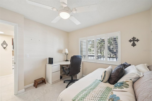1170 Bird Bay Way Unit 206, Venice, FL 34285 - bedroom featuring a ceiling fan and a desk
