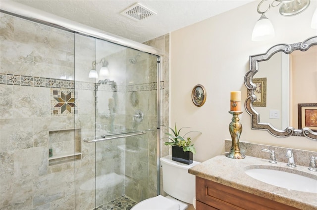 1170 Bird Bay Way Unit 206, Venice, FL 34285 - full bathroom with a stall shower, vanity, and toilet
