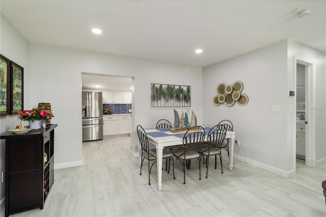1212 Princeton Ave, Bradenton, FL 34207 - dining space featuring recessed lighting, baseboards, and light wood-style floors