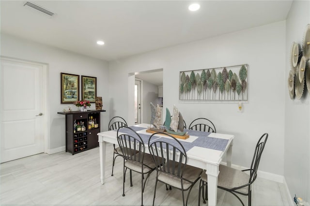 1212 Princeton Ave, Bradenton, FL 34207 - dining room with baseboards and recessed lighting