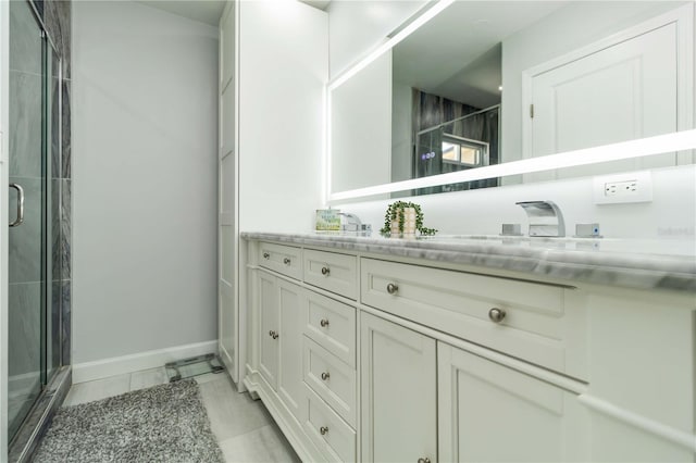 1212 Princeton Ave, Bradenton, FL 34207 - full bathroom featuring a stall shower, vanity, baseboards, and marble finish floors