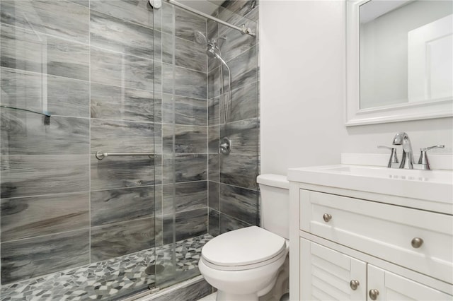 1212 Princeton Ave, Bradenton, FL 34207 - bathroom featuring toilet, a stall shower, and vanity
