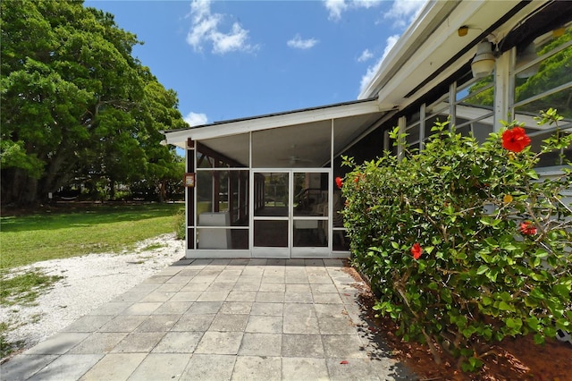 1212 Princeton Ave, Bradenton, FL 34207 - view of patio with a sunroom