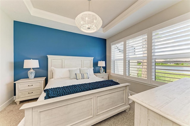 3027 Formia Ct, Lakewood Ranch, FL 34211 - bedroom with a tray ceiling, light carpet, a chandelier, and ornamental molding