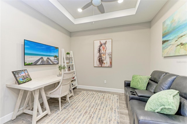 3027 Formia Ct, Lakewood Ranch, FL 34211 - office featuring a raised ceiling, a ceiling fan, recessed lighting, and light wood-style floors
