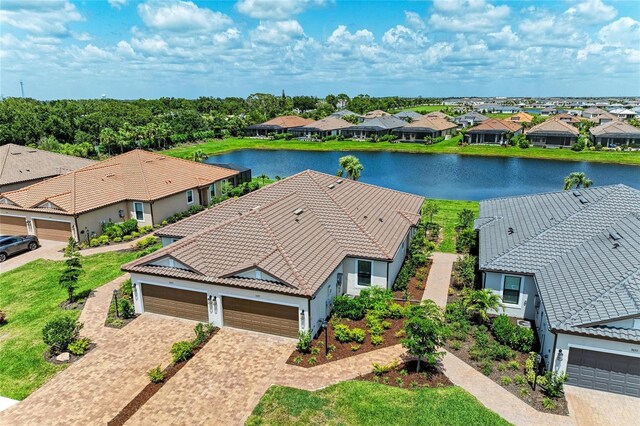 3027 Formia Ct, Lakewood Ranch, FL 34211 - aerial perspective of suburban area featuring a large body of water