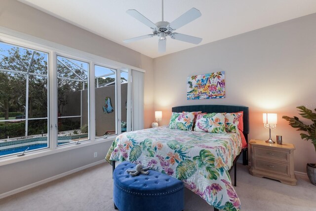bedroom featuring carpet floors, baseboards, and ceiling fan