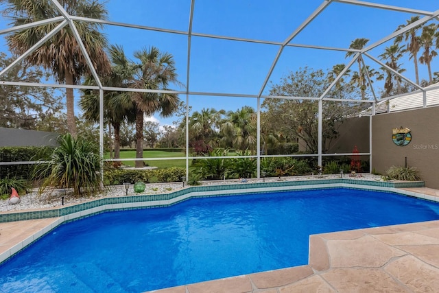 outdoor pool featuring a lanai