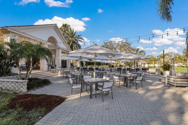 view of patio featuring outdoor dining area