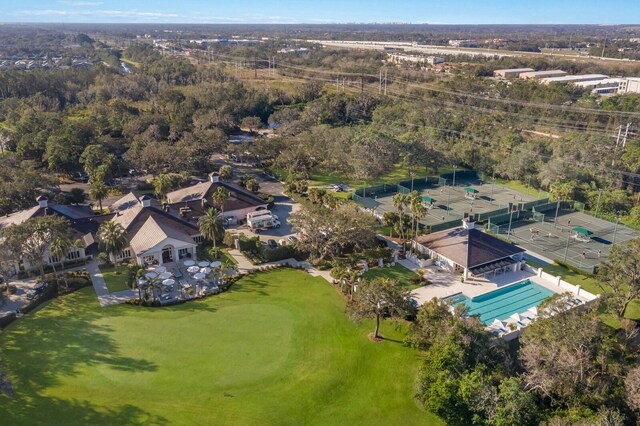 view of property location with a pool area