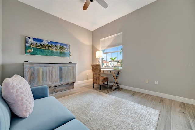 23233 Banbury Way Unit 302, Venice, FL 34293 - living room featuring a ceiling fan, wood finished floors, and baseboards