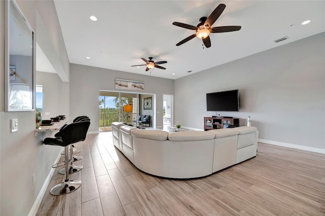 23233 Banbury Way Unit 302, Venice, FL 34293 - living area with light wood-style floors, a ceiling fan, baseboards, and recessed lighting