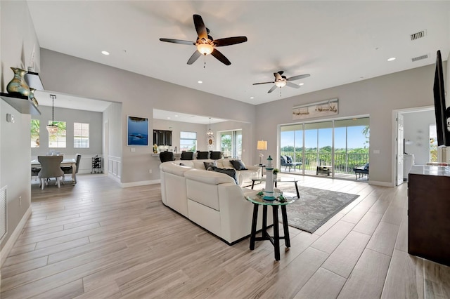 23233 Banbury Way Unit 302, Venice, FL 34293 - living area featuring light wood-style flooring, ceiling fan, baseboards, and recessed lighting