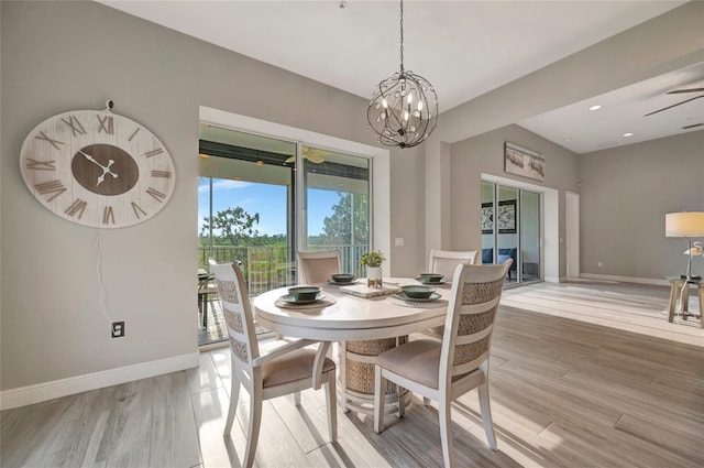 23233 Banbury Way Unit 302, Venice, FL 34293 - dining area with light wood-style floors, a chandelier, baseboards, and recessed lighting