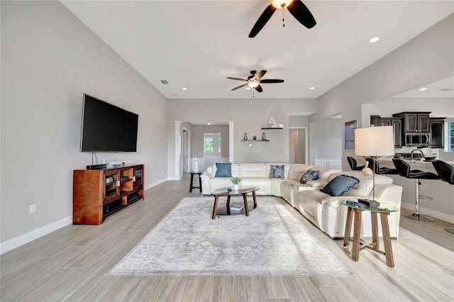 23233 Banbury Way Unit 302, Venice, FL 34293 - living area with ceiling fan, light wood-style flooring, baseboards, and recessed lighting