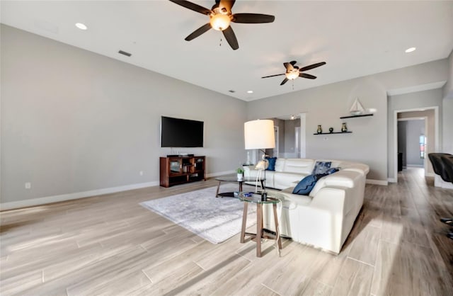 23233 Banbury Way Unit 302, Venice, FL 34293 - living area with ceiling fan, light wood-type flooring, baseboards, and recessed lighting