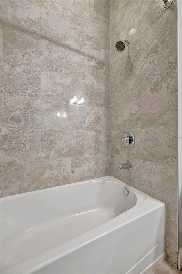 23233 Banbury Way Unit 302, Venice, FL 34293 - bathroom featuring tub / shower combination