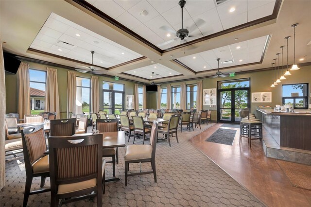 23233 Banbury Way Unit 302, Venice, FL 34293 - dining space with a ceiling fan, crown molding, coffered ceiling, french doors, and recessed lighting