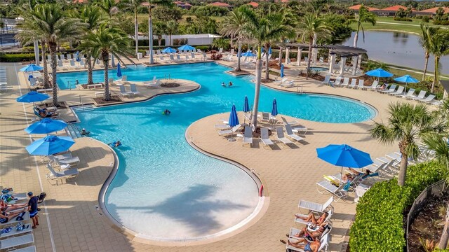 23233 Banbury Way Unit 302, Venice, FL 34293 - community pool with a patio area