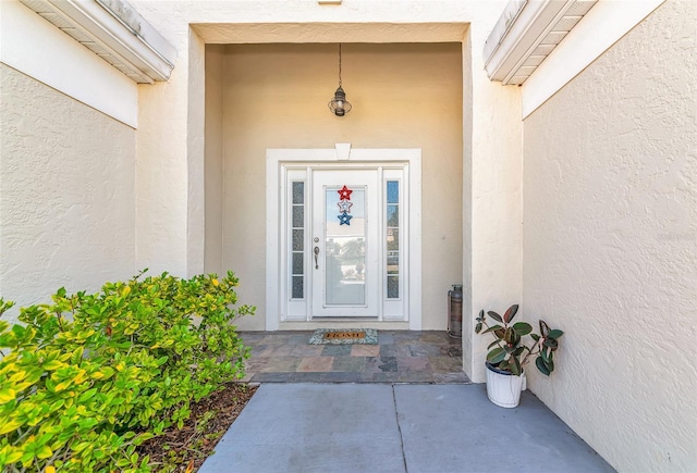 230 Fareham Dr, Venice, FL 34293 - view of exterior entry with stucco siding