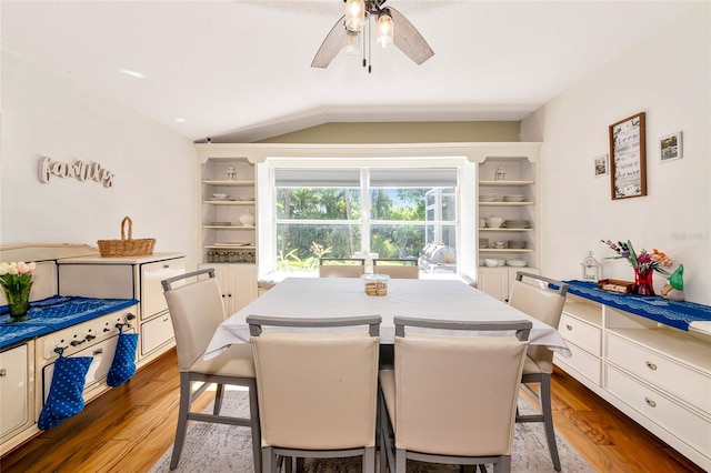 230 Fareham Dr, Venice, FL 34293 - dining area featuring lofted ceiling, wood finished floors, and a ceiling fan